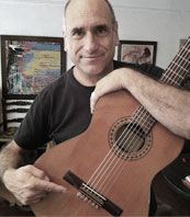 David Broza using strig tie