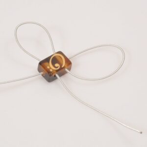 String Tie - A Single Amber Bead